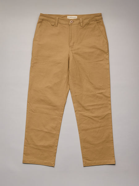 Tan pants on a gray background