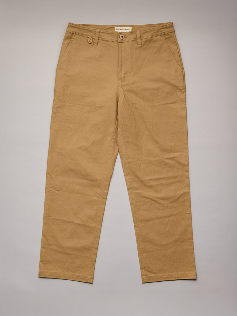 Tan pants on a gray background